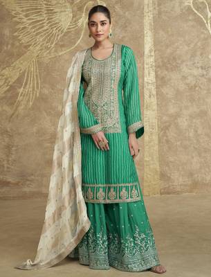 Green embroidered chinnon silk free size stitch gharara suit with dupatta 1