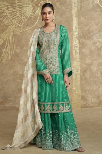 Green embroidered chinnon silk free size stitch gharara suit with dupatta