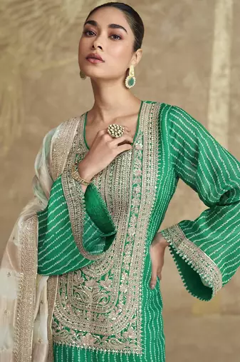 Green embroidered chinnon silk free size stitch gharara suit with dupatta