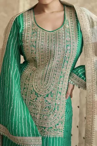 Green embroidered chinnon silk free size stitch gharara suit with dupatta