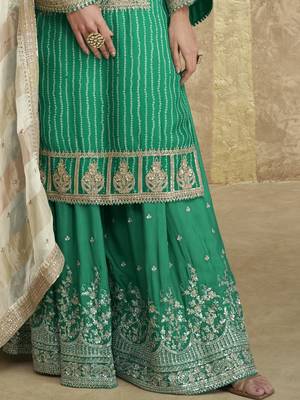 Green embroidered chinnon silk free size stitch gharara suit with dupatta 4