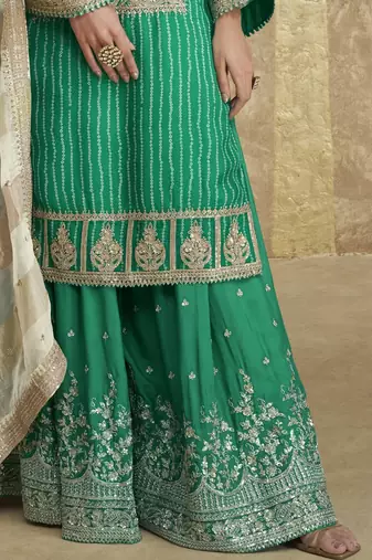 Green embroidered chinnon silk free size stitch gharara suit with dupatta