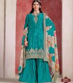 Turquoise embroidered chinon silk free size stitched sharara suit