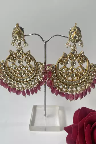 Gold plated pink stone dangle earrings