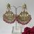Gold plated pink stone dangle earrings