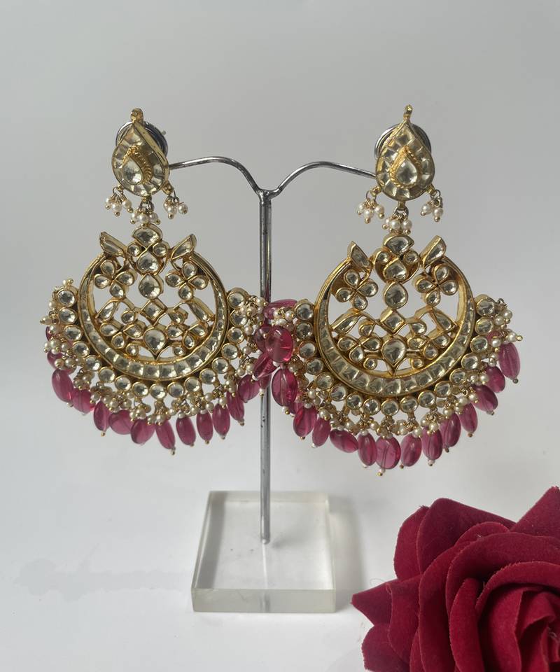 Gold plated pink stone dangle earrings