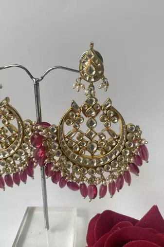 Gold plated pink stone dangle earrings