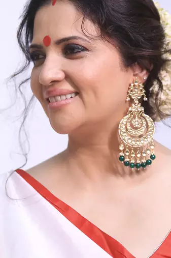 Gold plated Green dangler earrings