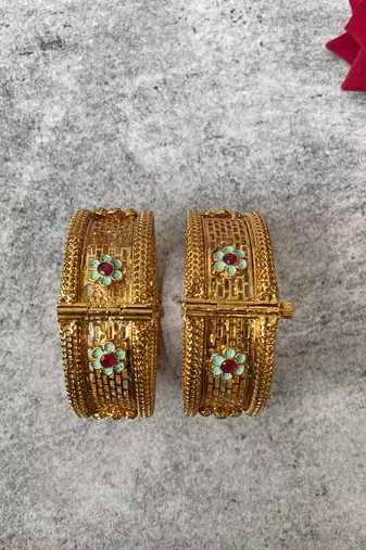 Gold plated studded bangle