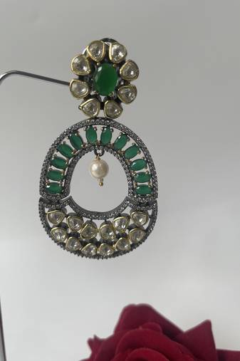 Gold plated green kundan earrings