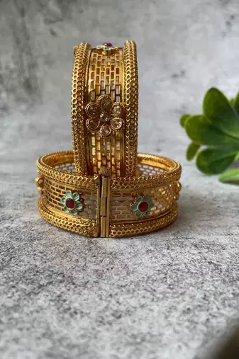 Gold plated studded bangle