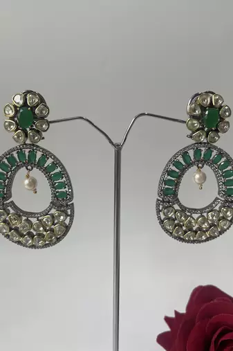 Gold plated green kundan earrings