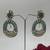 Gold plated green kundan earrings
