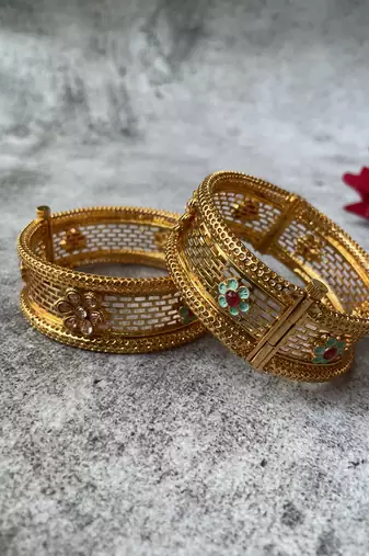 Gold plated studded bangle
