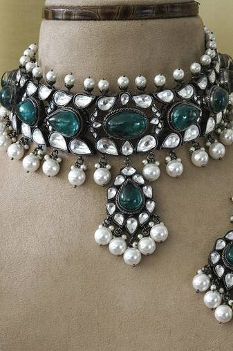 Silver plated pearl necklace with green stone