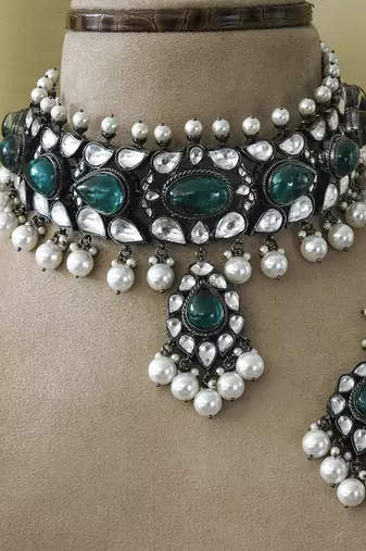 Silver plated pearl necklace with green stone