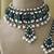 Silver plated pearl necklace with green stone