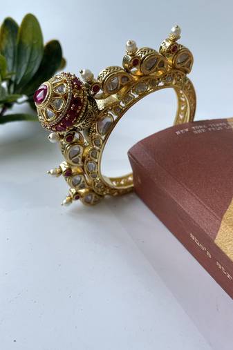 Gold plated pink stone bangle