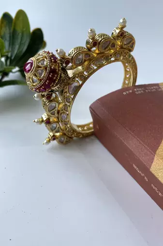 Gold plated pink stone bangle