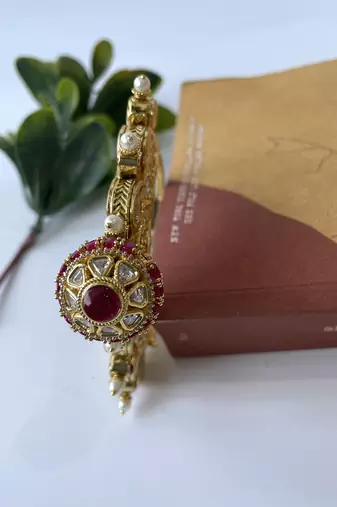 Gold plated pink stone bangle