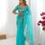 Organza turquoise blue saree with organza blouse