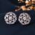 Silver-toned floral ad stud earrings