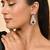 Silver-plated blue stone drop earrings with american diamond
