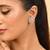 Silver-toned floral ad stud earrings
