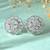 Silver-toned floral ad stud earrings
