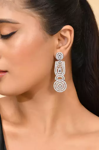 Silver-plated circular statement earrings with american diamonds
