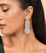 Silver-plated circular statement earrings with american diamonds