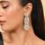Silver-plated circular statement earrings with american diamonds