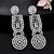 Silver-plated circular statement earrings with american diamonds