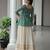 Green Georgette Kutchi Work Peplum Top With Cotton Flared Lehenga