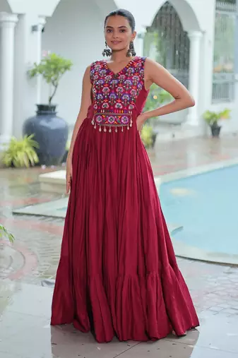 Maroon rayon kutchi gamthi thread embroidered & mirror work navratri gown