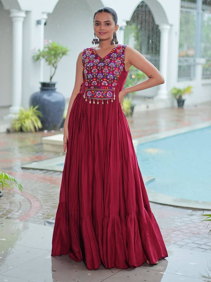 Maroon rayon kutchi gamthi thread embroidered & mirror work navratri gown