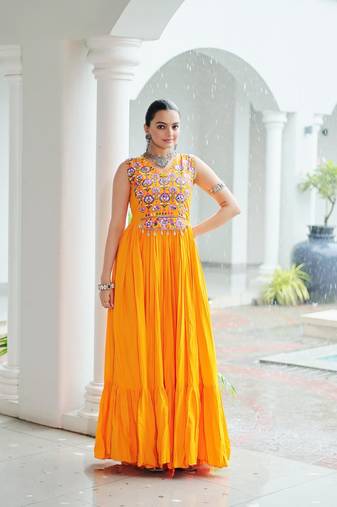 Yellow rayon kutchi gamthi thread embroidered & mirror work navratri gown