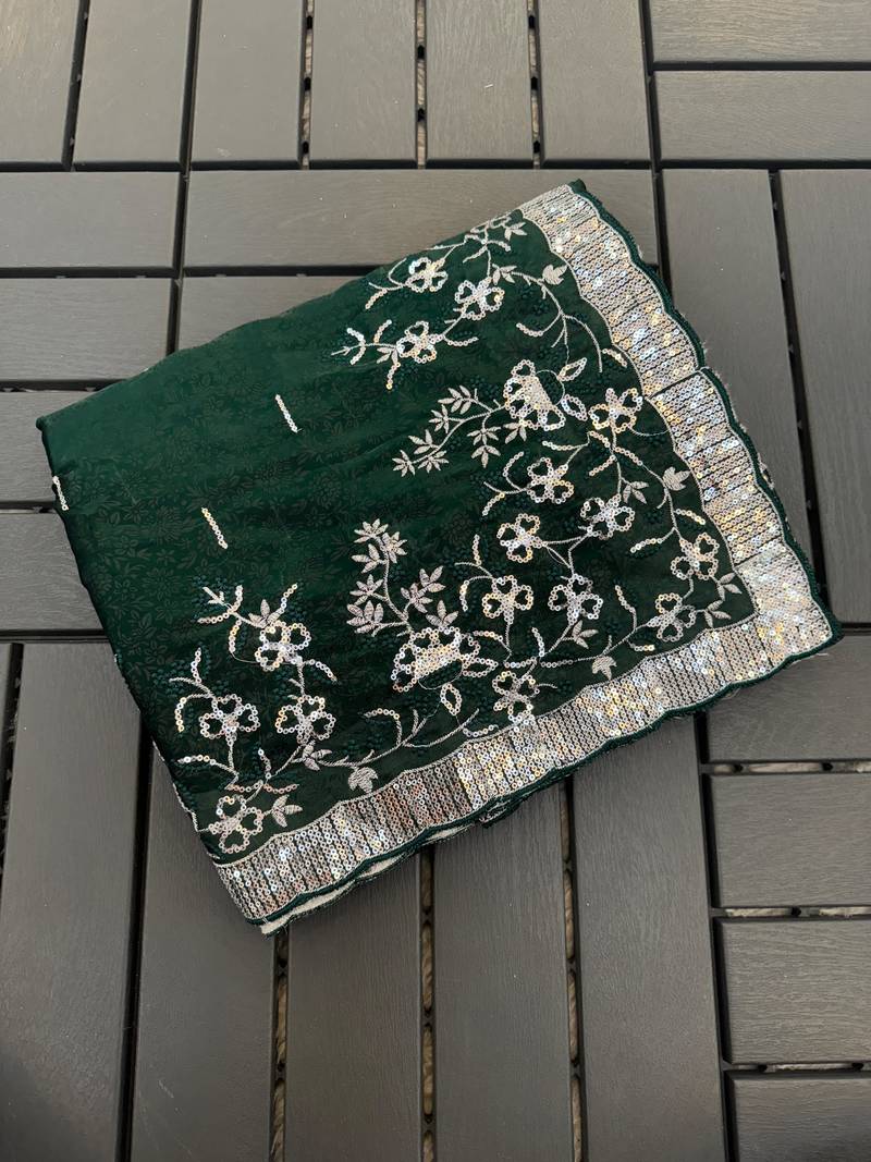 Dark Green embroidered print Jimmy Choo Saree with stitched blouse