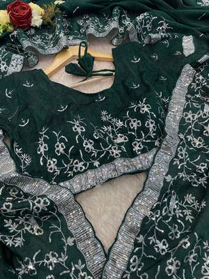 Dark Green embroidered print Jimmy Choo Saree with stitched blouse 4