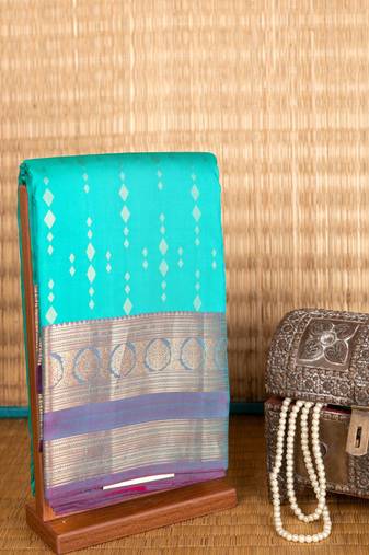 Pastel green and pink pure touch silk saree