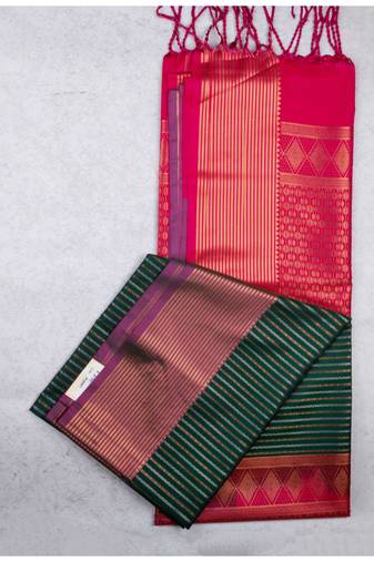 Dark green semi soft silk saree