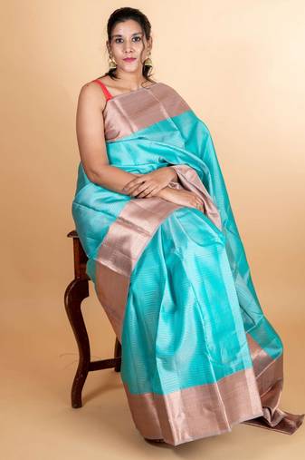 Traditional turqouise multistrip pure silk saree