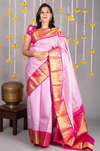 Pink silk saree with golden border