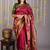 Maroon and gold saree