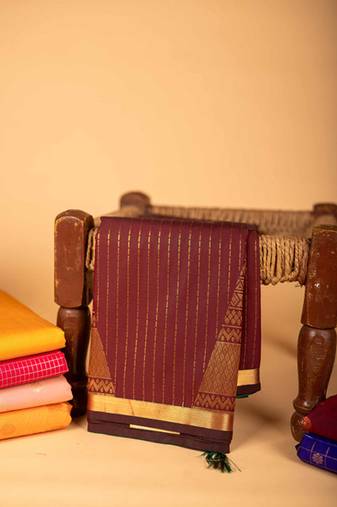 Maroon temple border semi silk saree