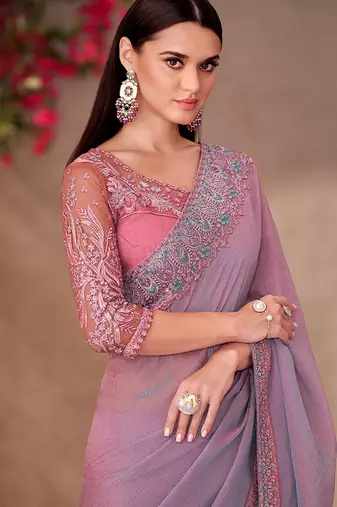Mauve pink faux georgette embroidered border work saree