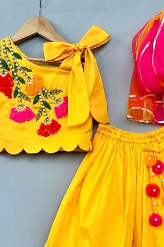 Floral & pearl embroidered top with matching lehenga in yellow for girls