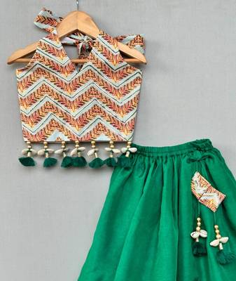 Stylish halter top with matching green lehenga for girls 2