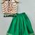 Stylish halter top with matching green lehenga for girls