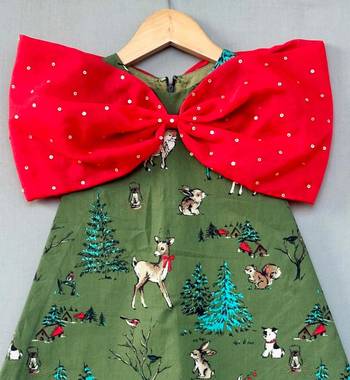 Animal printed green aline dress with big red bow for girls 1